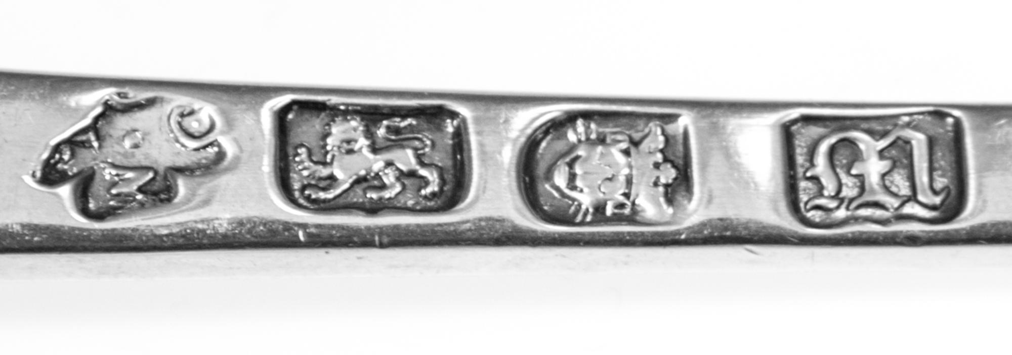 A Group of Five Georgian Silver Serving Spoons, Various Makers, comprising a George III serving spoon with an Old English handle, Thoma