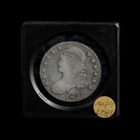 A Collection of Fourteen Capped Bust and Seated Liberty 50c Coins