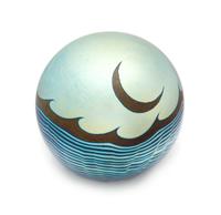 Correia Art Glass, Fountain Valley, California, a moon and waves iridescent surface-design paperweight