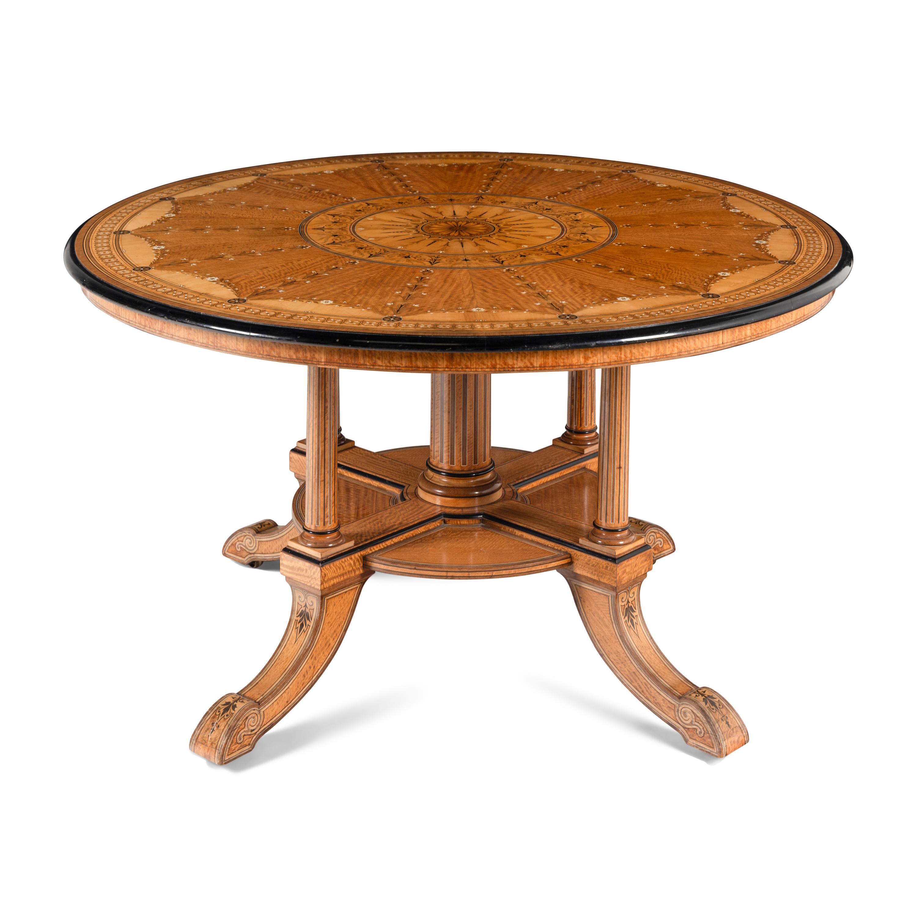 An English Part-Ebonized Satinwood, Harewood and Marquetry Center Table