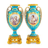 A Pair of Sèvres Style Porcelain and Gilt Bronze Mounted Vases