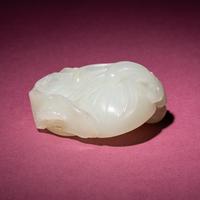 A Chinese White Jade Carving of Double Lotus Pods, 18th/19th Century — 清中期 白玉雙蓮子把件