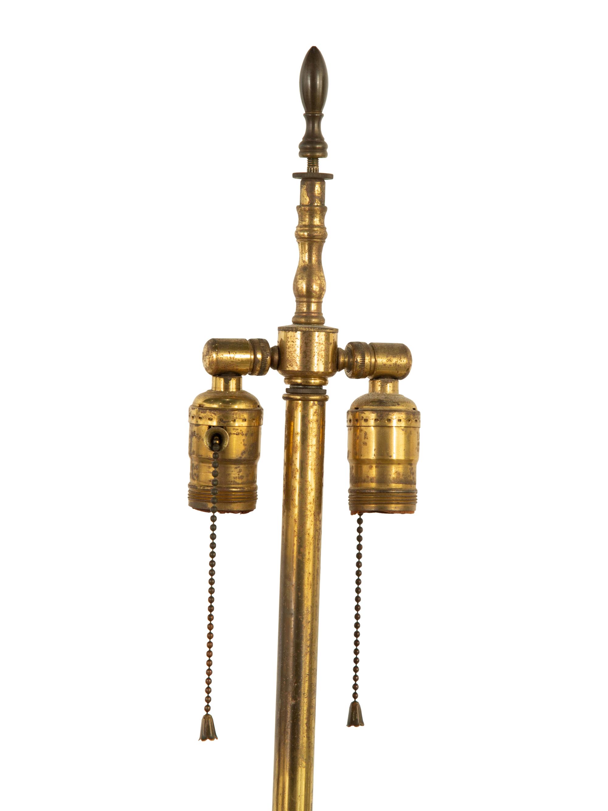 A Pair of French Porcelain Urns Mounted as Lamps