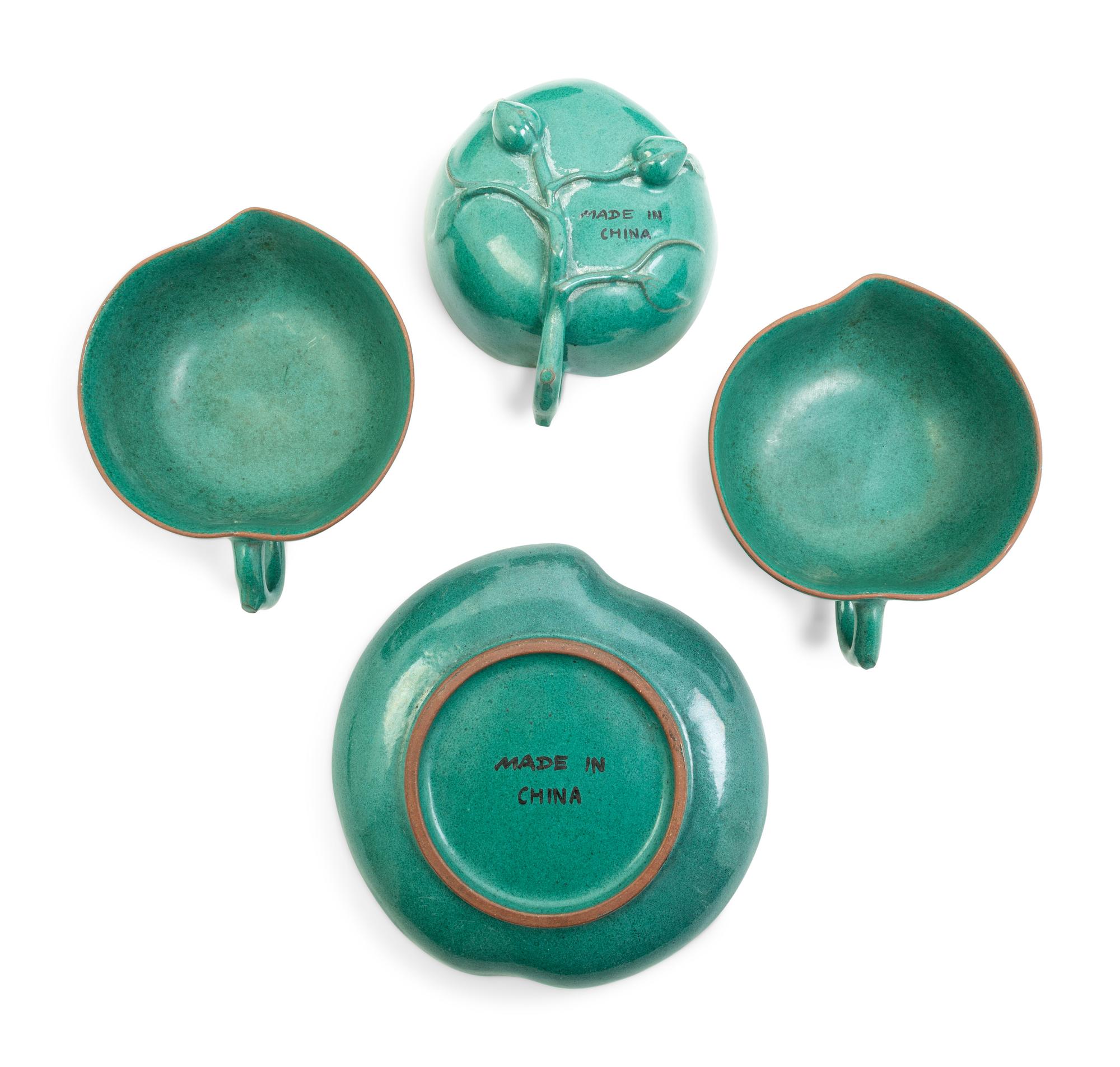 A Chinese Green Glazed Zisha Pottery Tea Set