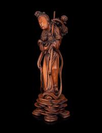 A Chinese Boxwood Figure of a Female Immortal