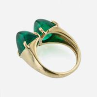 A Yellow Gold and Sugarloaf Emerald Ring