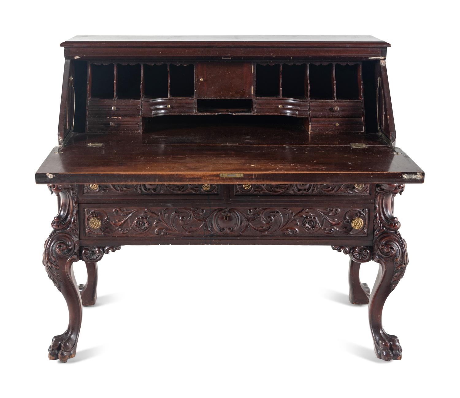 A Renaissance Revival Carved Mahogany Slant-Front Bureau