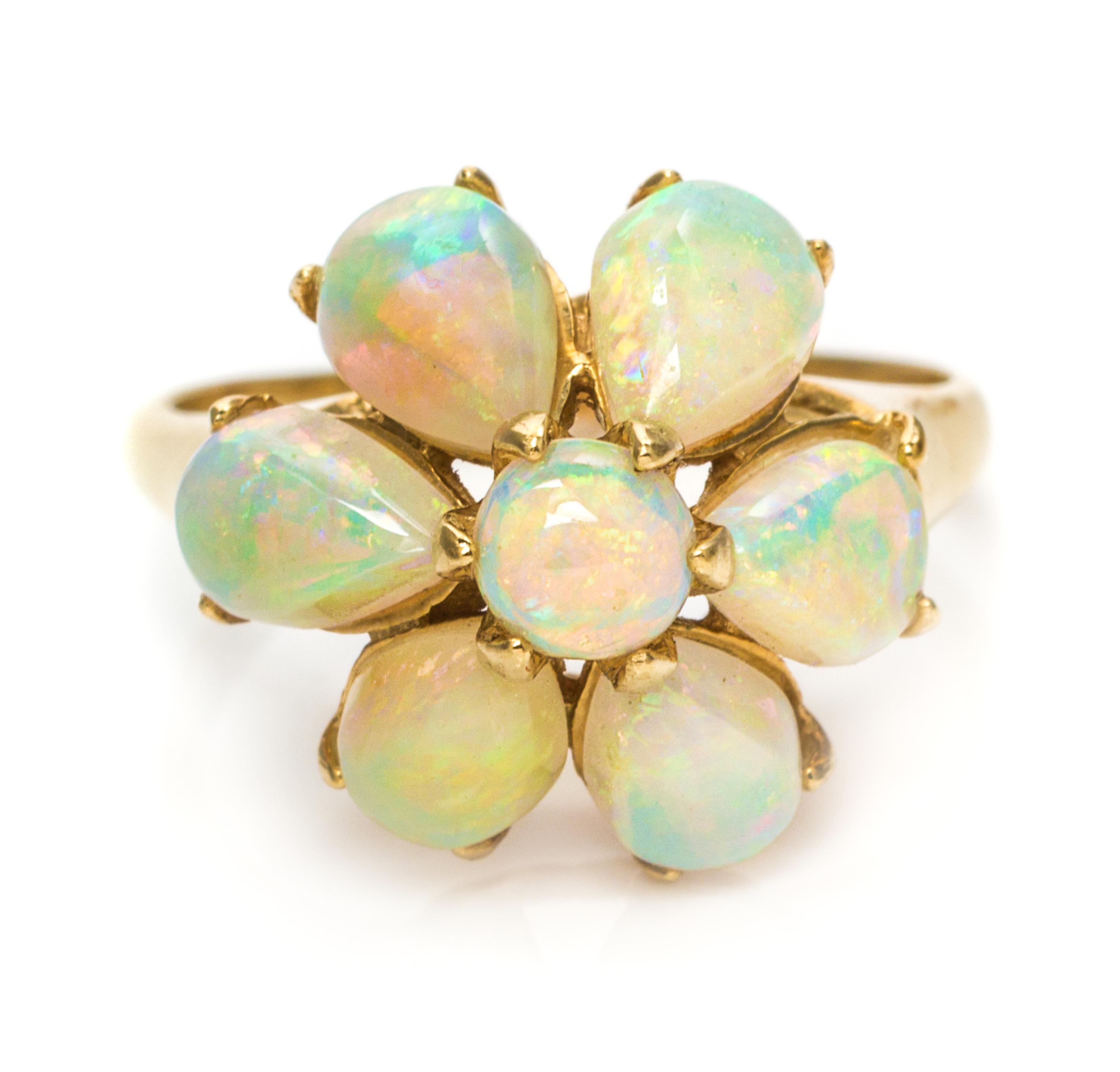 A 14 Karat Yellow Gold and Opal Ring, 2.50 dwts.
