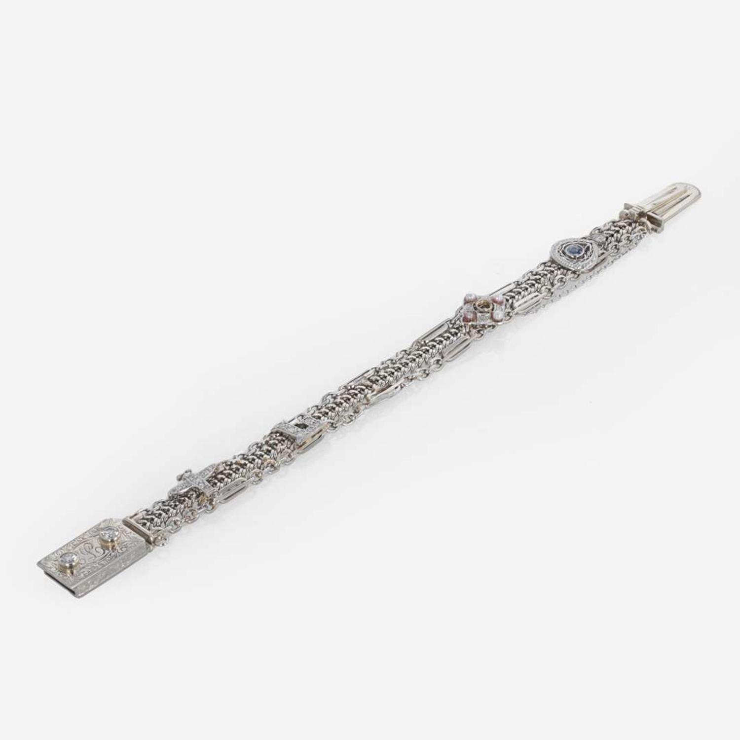 A 14 Karat White Gold and Diamond Bracelet