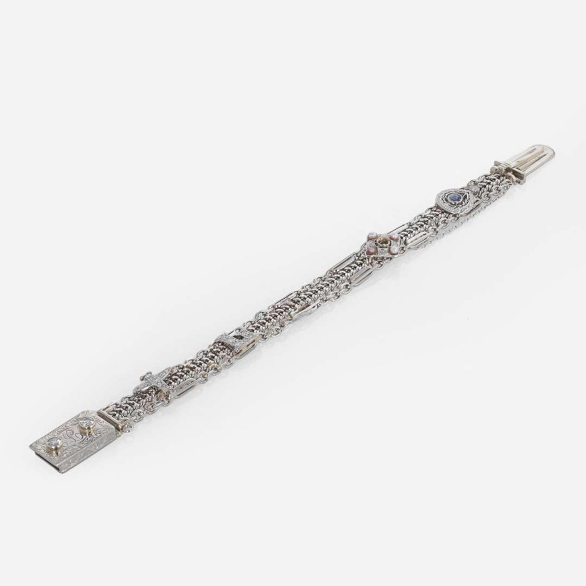 A 14 Karat White Gold and Diamond Bracelet