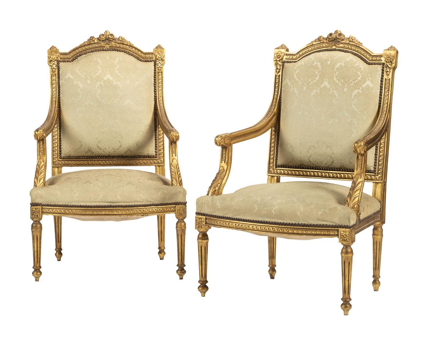 A Pair of Louis XVI-style Carved and Gilt Fauteuils