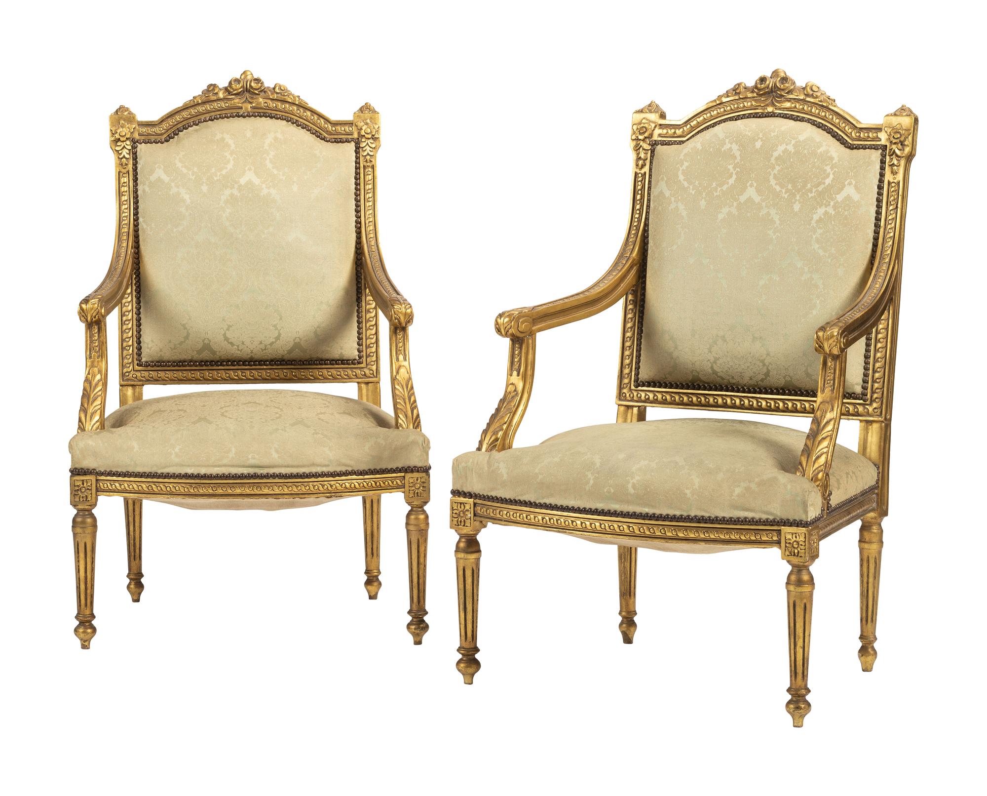 A Pair of Louis XVI-style Carved and Gilt Fauteuils