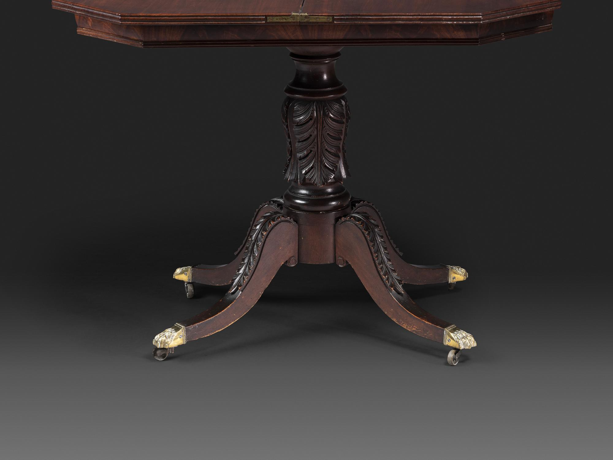 A Classical Carved and Brass Mounted Mahogany Claw-Foot Card Table