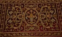 A Continental Gold Thread Embroidered Red Velvet Cloth