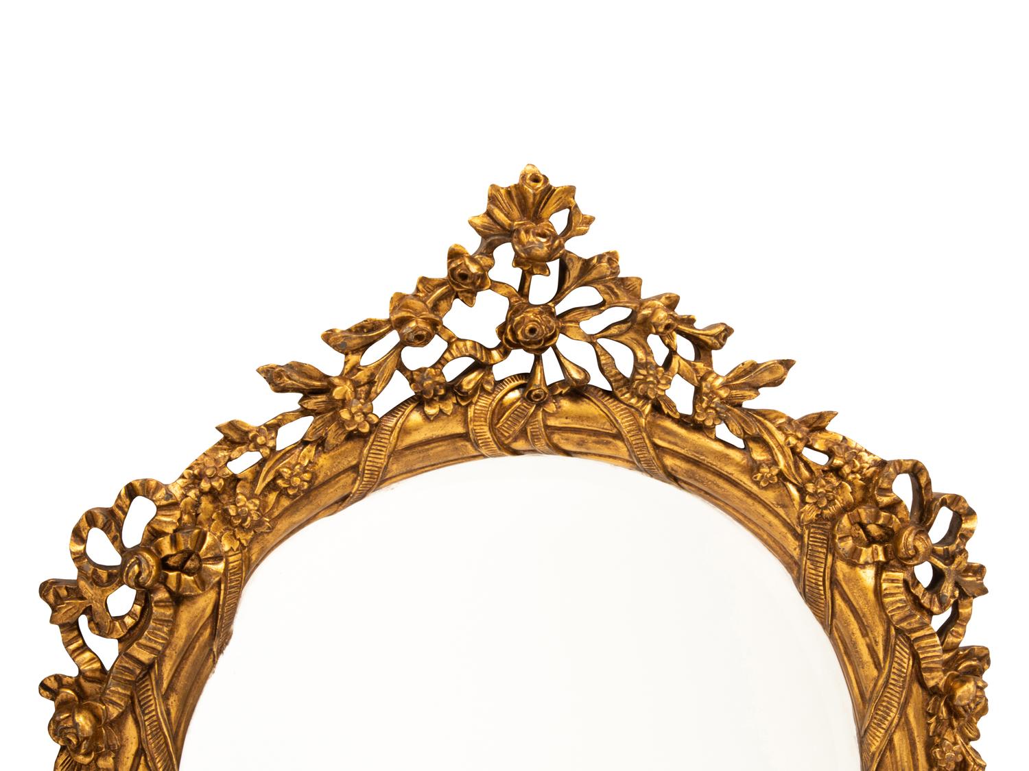 A Pair of Italian Rococo Style Gilded Mirrors