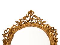 A Pair of Italian Rococo Style Gilded Mirrors