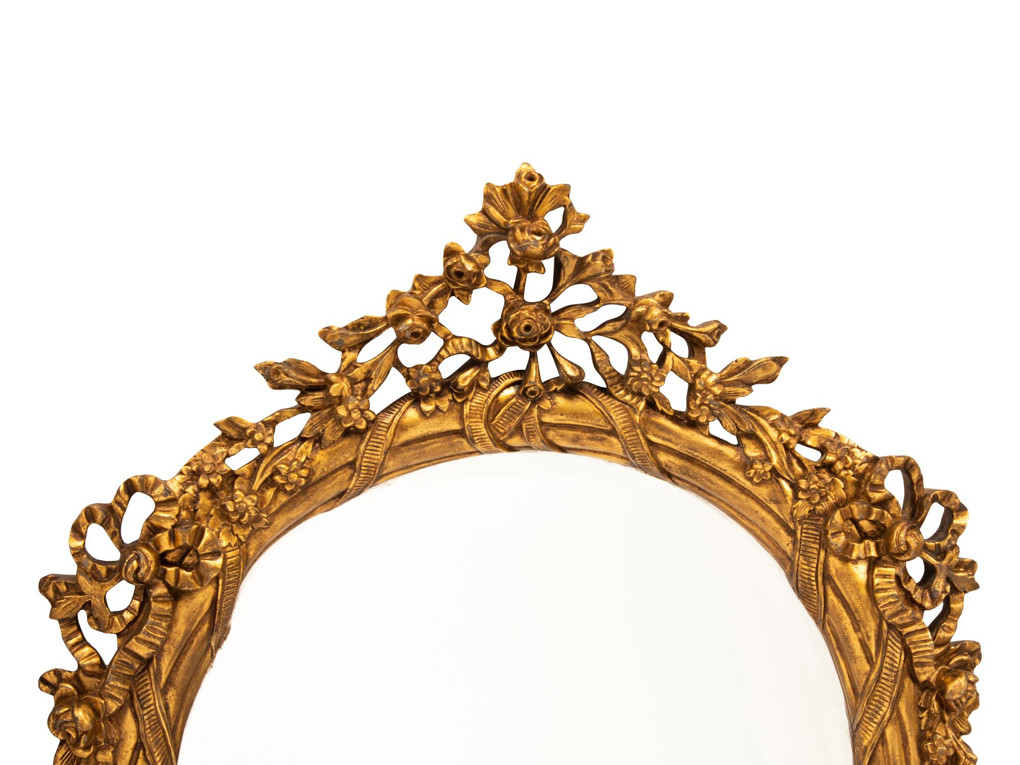 A Pair of Italian Rococo Style Gilded Mirrors