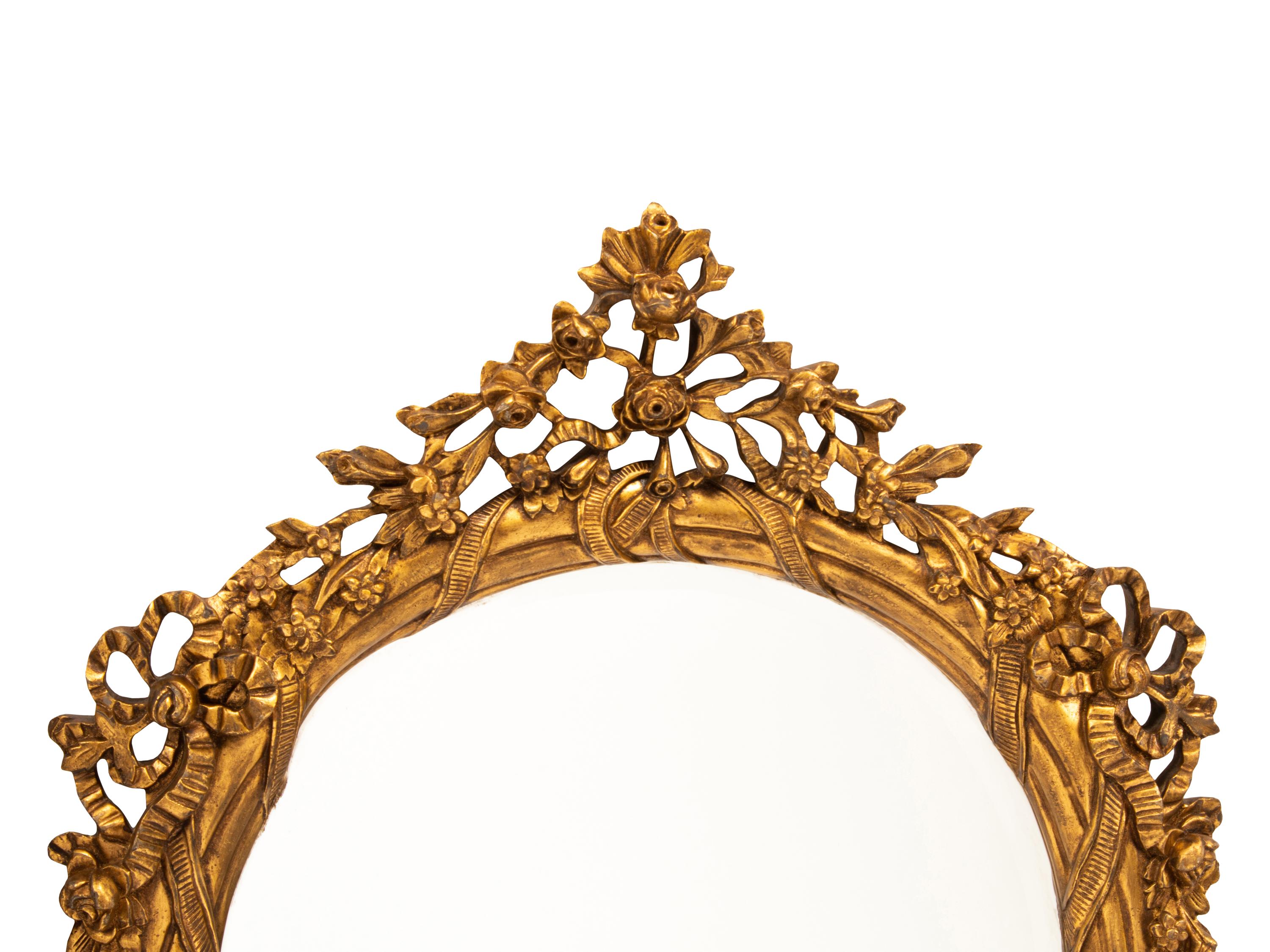 A Pair of Italian Rococo Style Gilded Mirrors