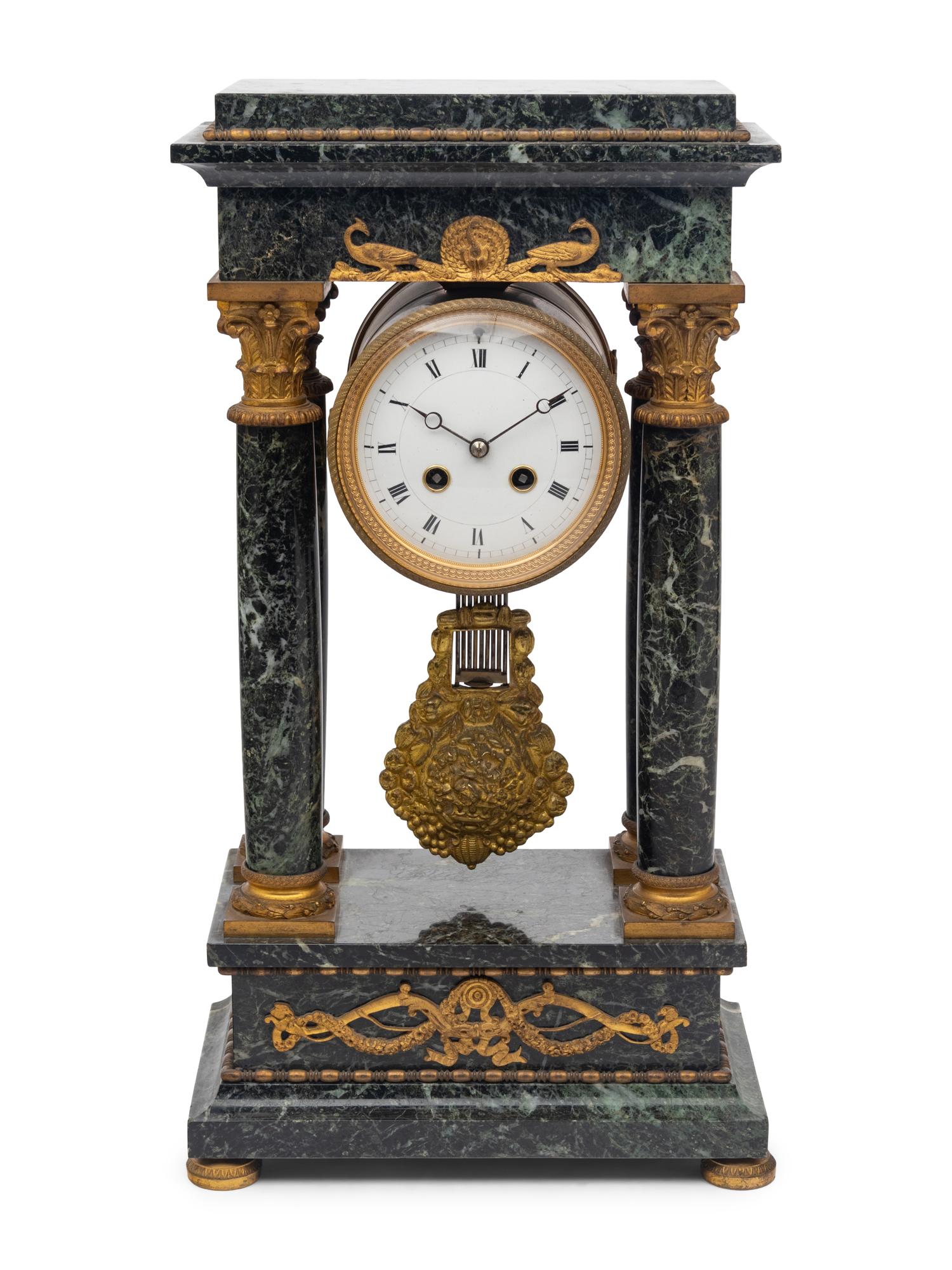 An Empire Style Gilt Bronze Mounted Marble Portico Clock