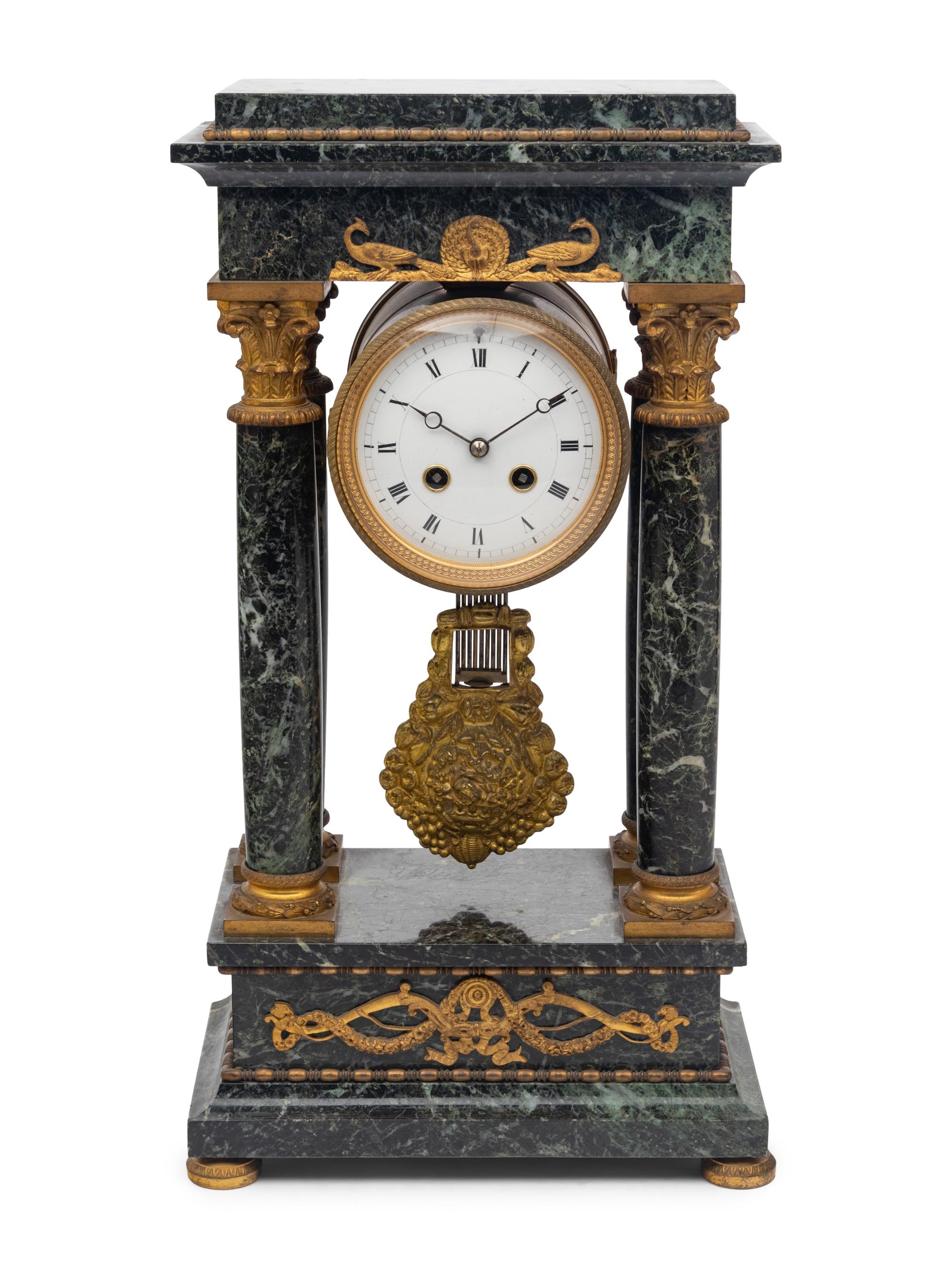 An Empire Style Gilt Bronze Mounted Marble Portico Clock