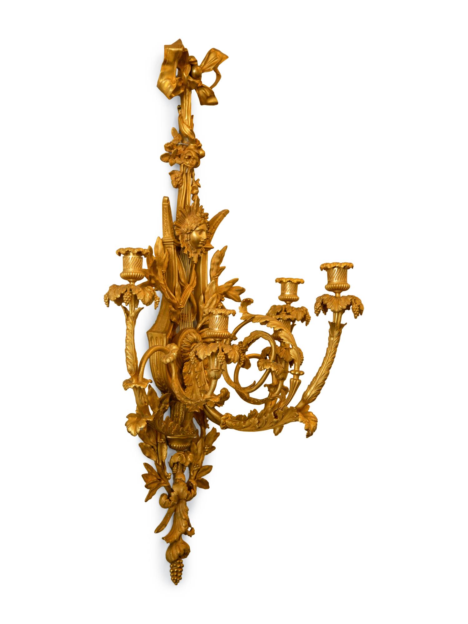 A Set of Four Louis XVI Style Gilt Bronze Five-Light Sconces