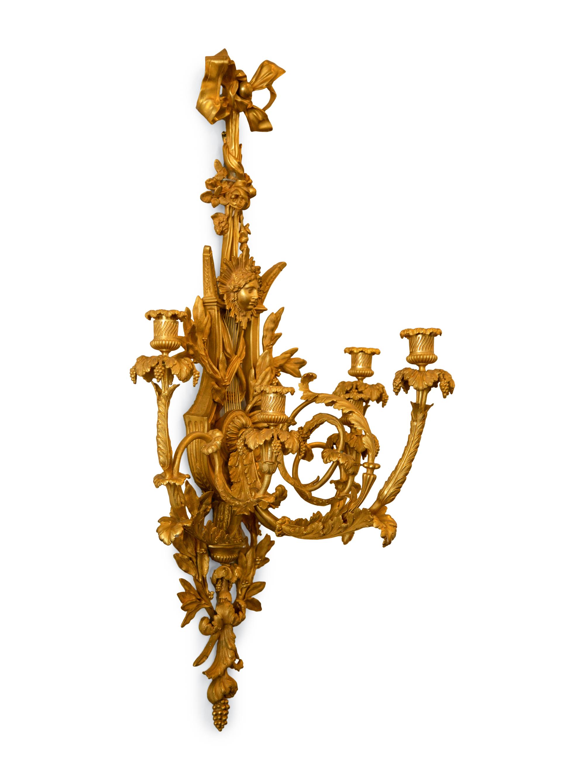 A Set of Four Louis XVI Style Gilt Bronze Five-Light Sconces