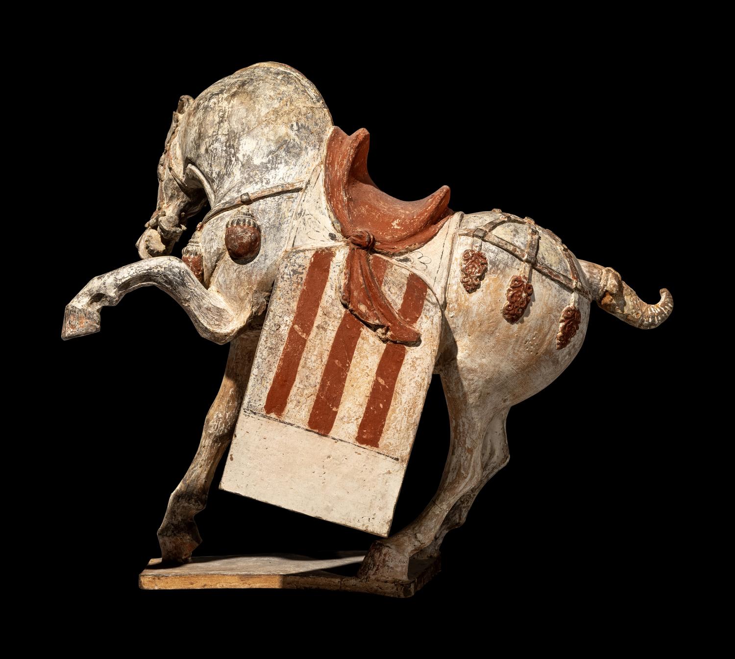 A Chinese Painted Pottery Figure of a Horse