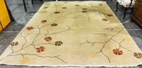 An Indian Wool Rug Width 8 feet 11 inches. — 20TH CENTURY