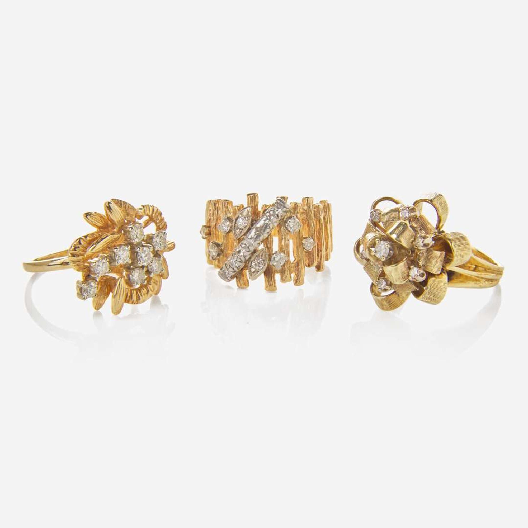 A Collection of Three Yellow Gold and Diamond Rings