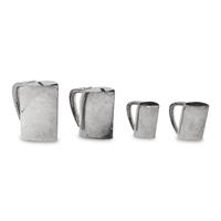 A Group of Four Ercuis Silver-Plate Milk or Cream Pitchers