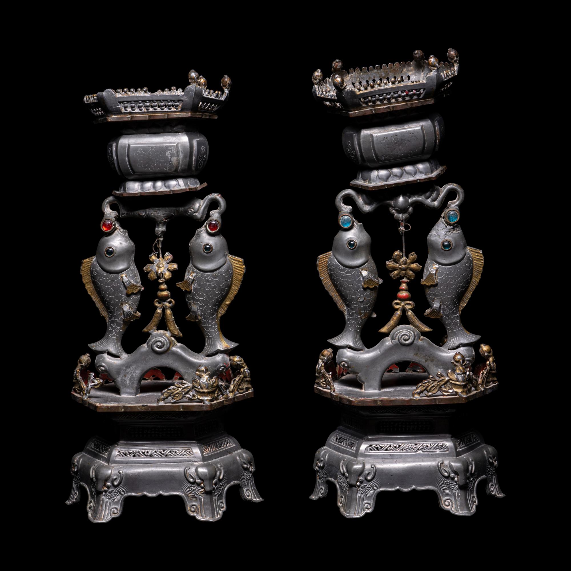 A Pair of Chinese Glass Inset Pewter 'Abundance' Candle Holders