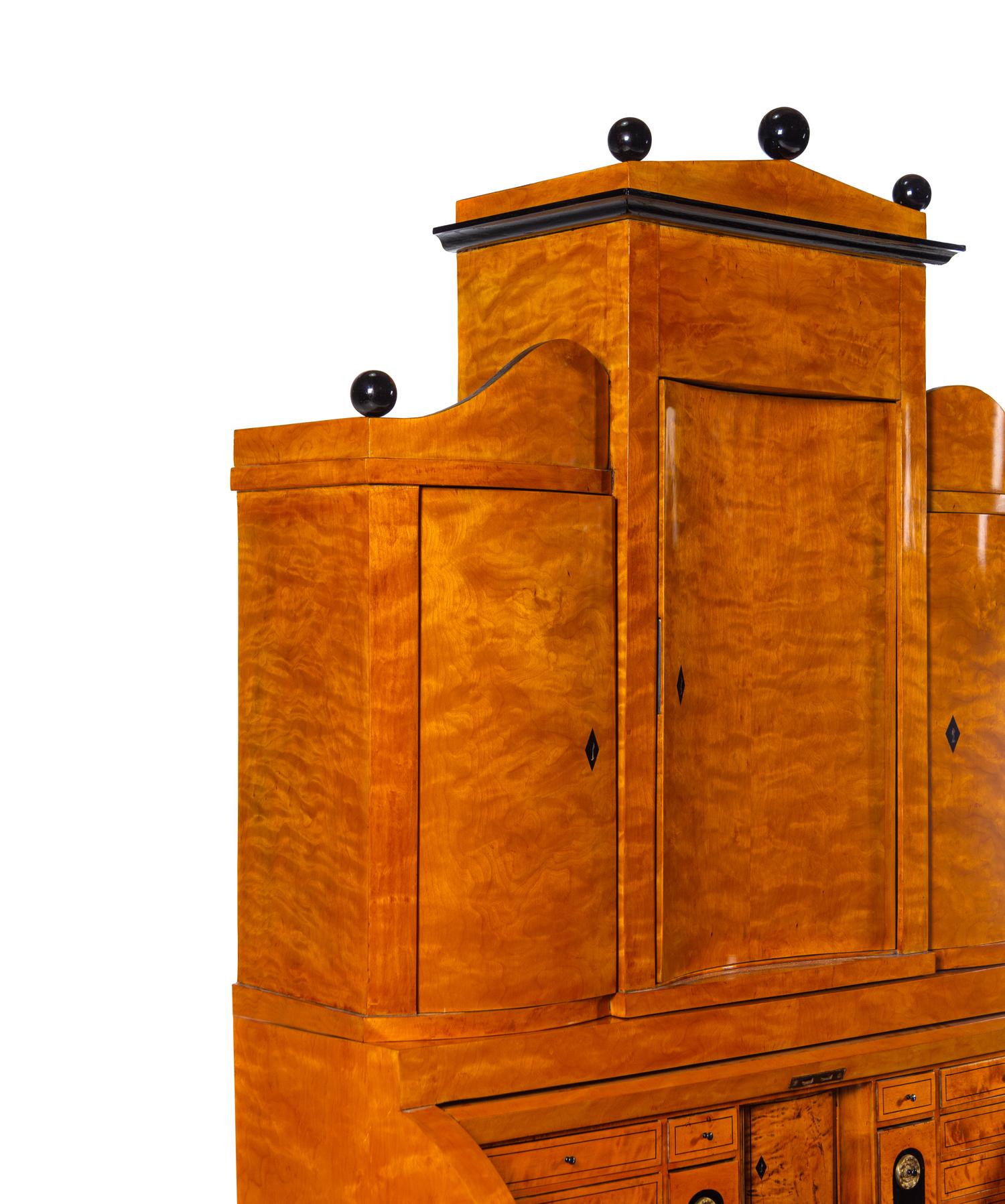 A Biedermeier Parcel Ebonized Birch Secretary Bureau