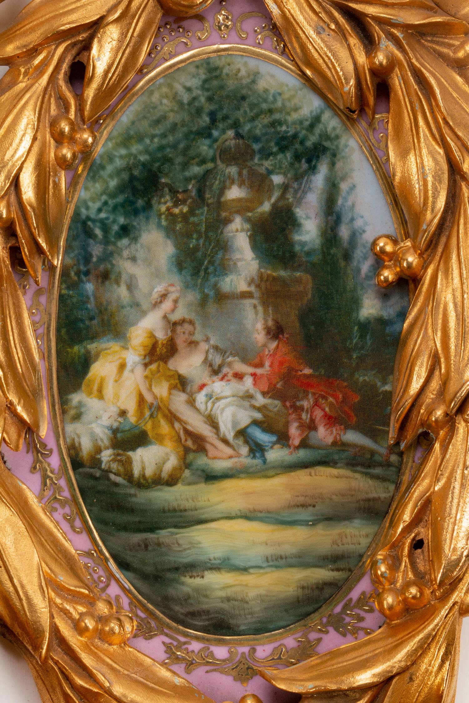 A Pair of Louis XVI Style Porcelain-Mounted Gilt-Bronze Four-Light Sconces