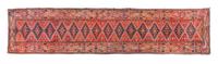 A Persian Wool Runner 20 feet 2 inches x 3 feet 3 inches.