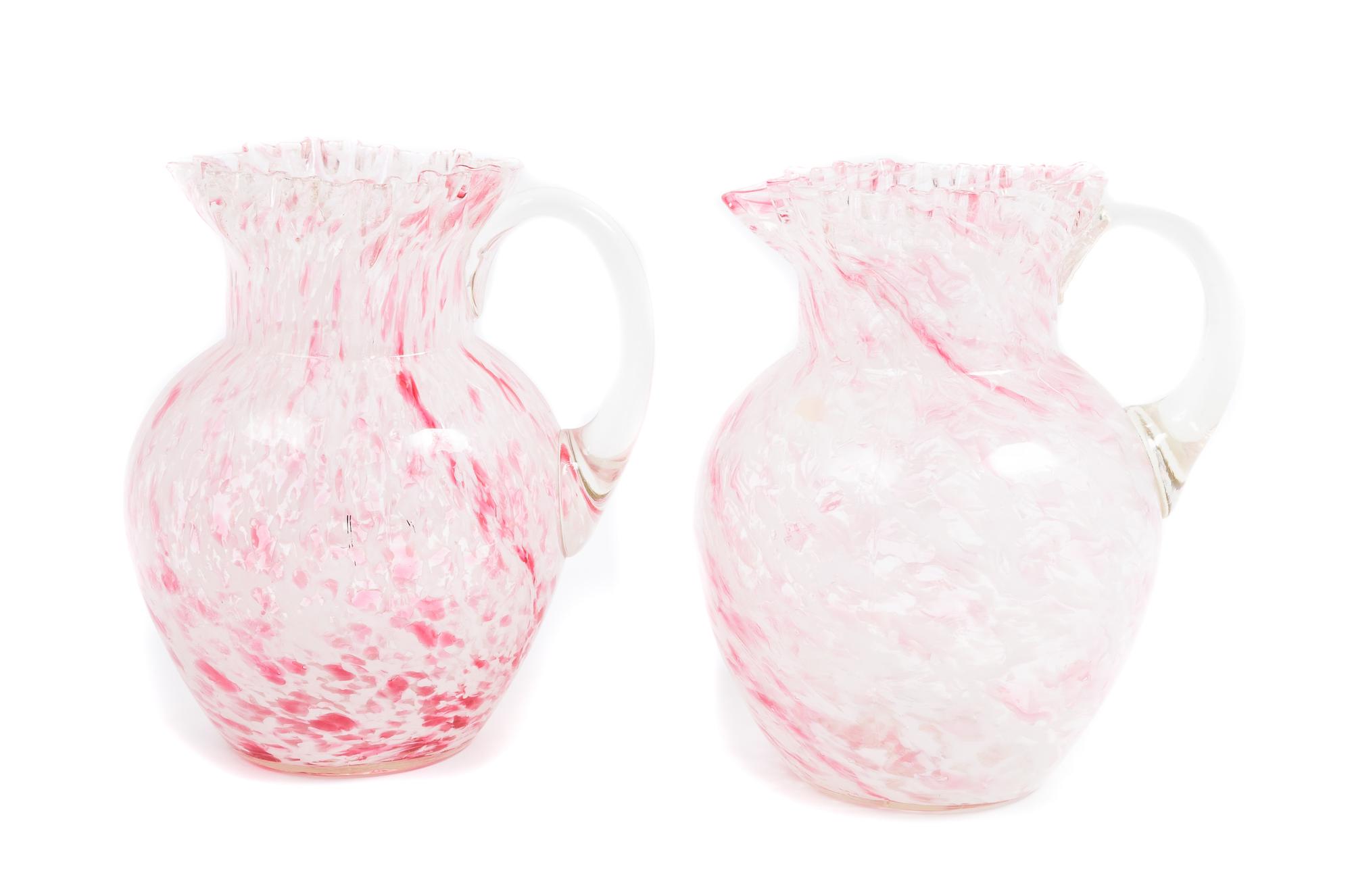 A Near Pair of Speckled Glass Pitchers Height 8 1/2 inches