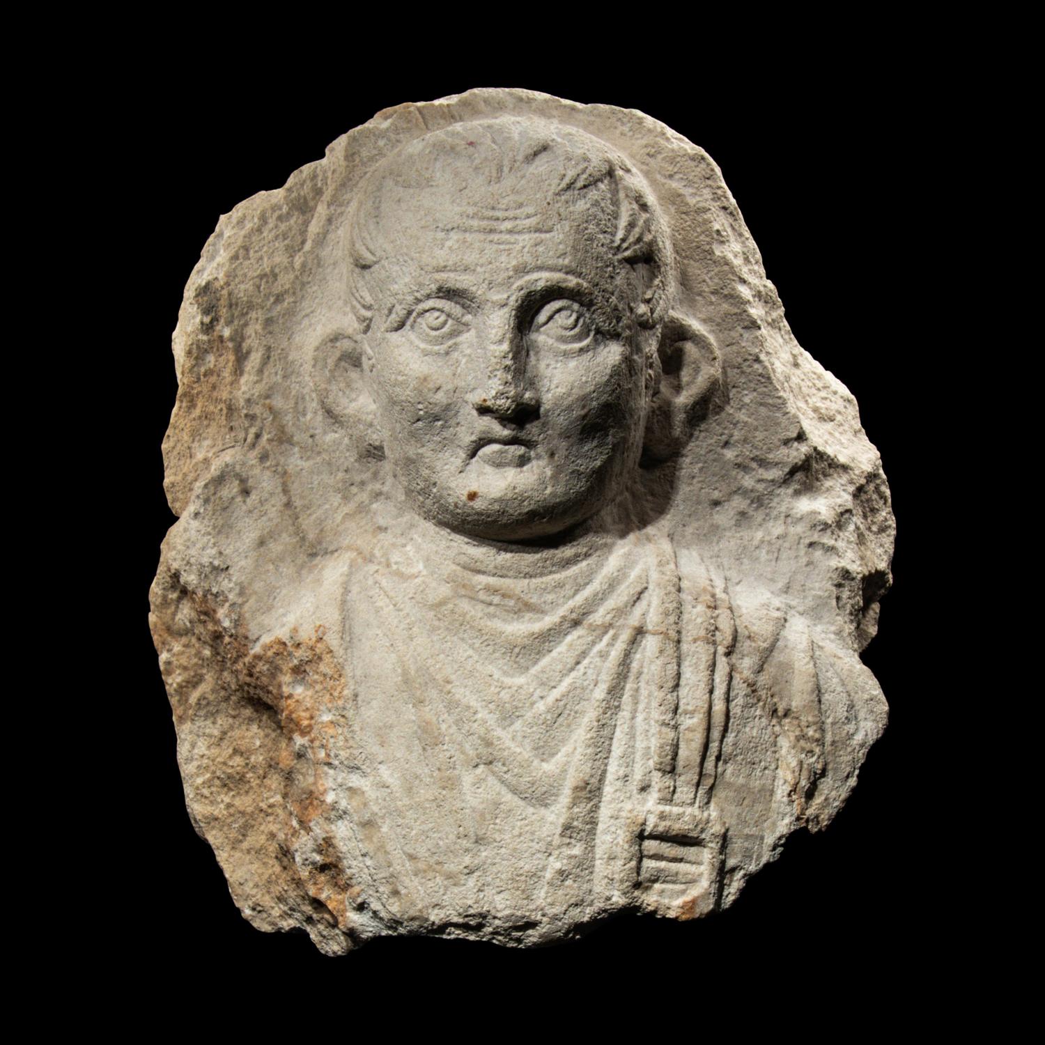 A Palmyrene Limestone Bust of a Man