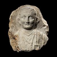 A Palmyrene Limestone Bust of a Man