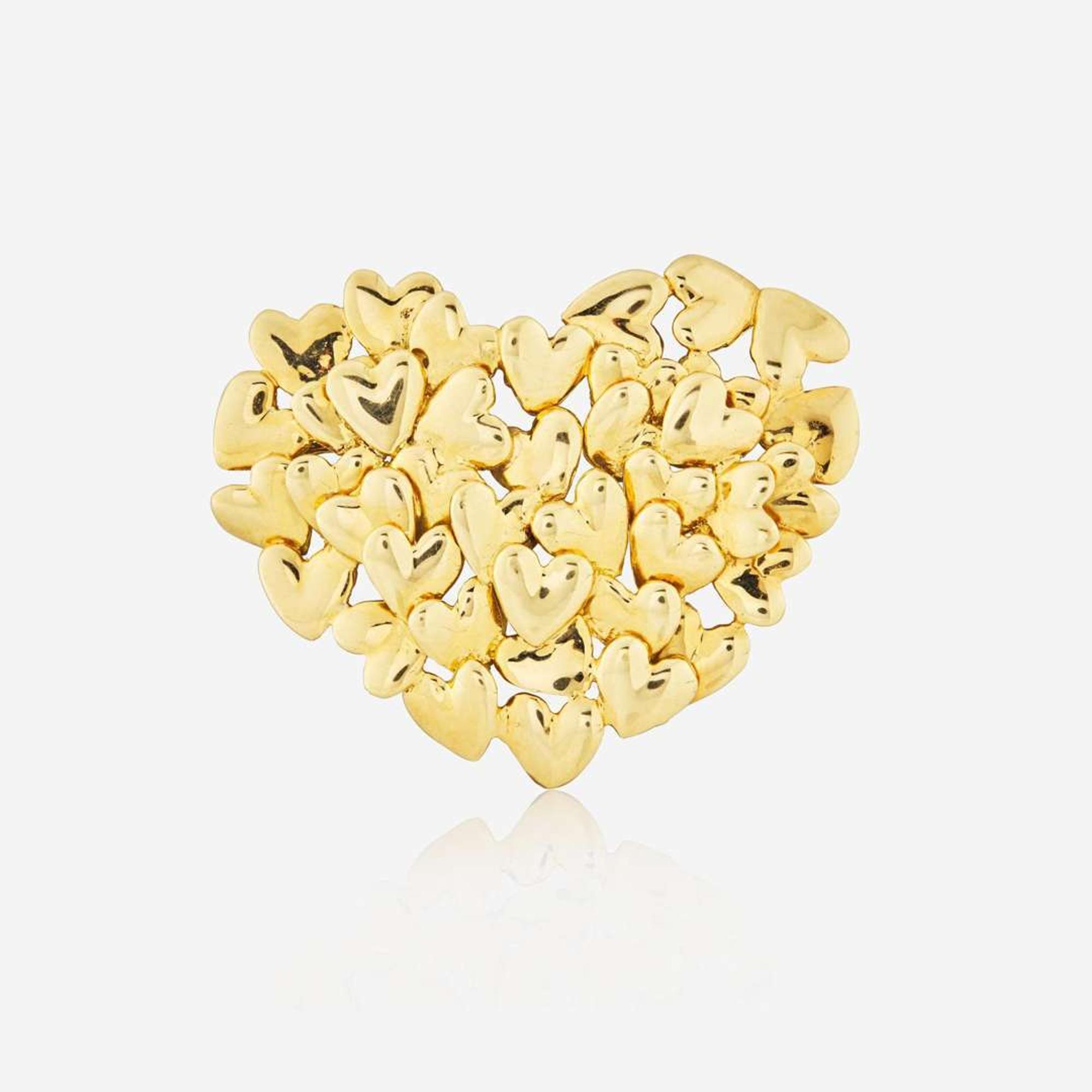 An 18K Yellow Gold Pin by Movado