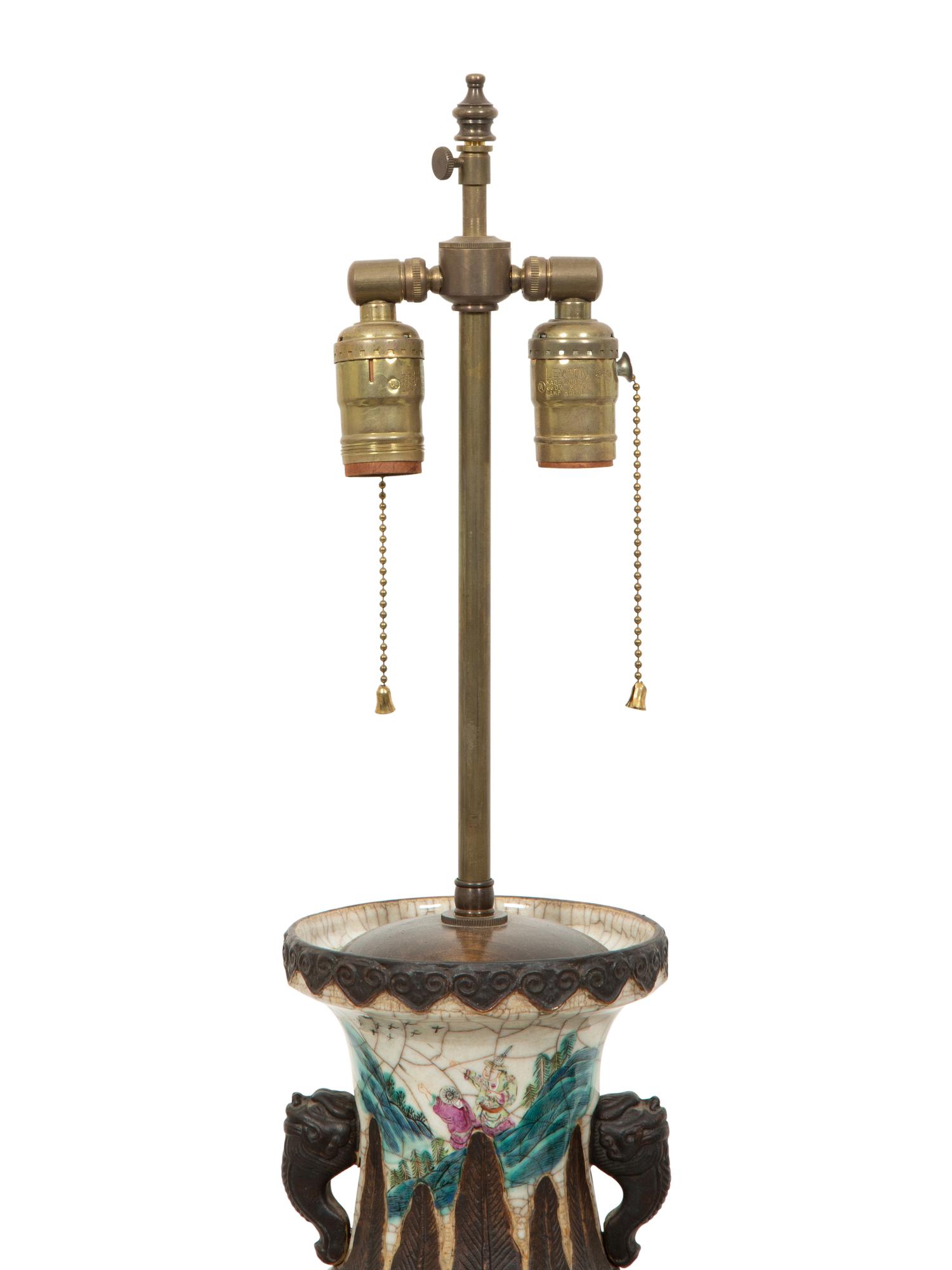 A Pair of Chinese Glazed Ceramic Vases Mounted as Lamps