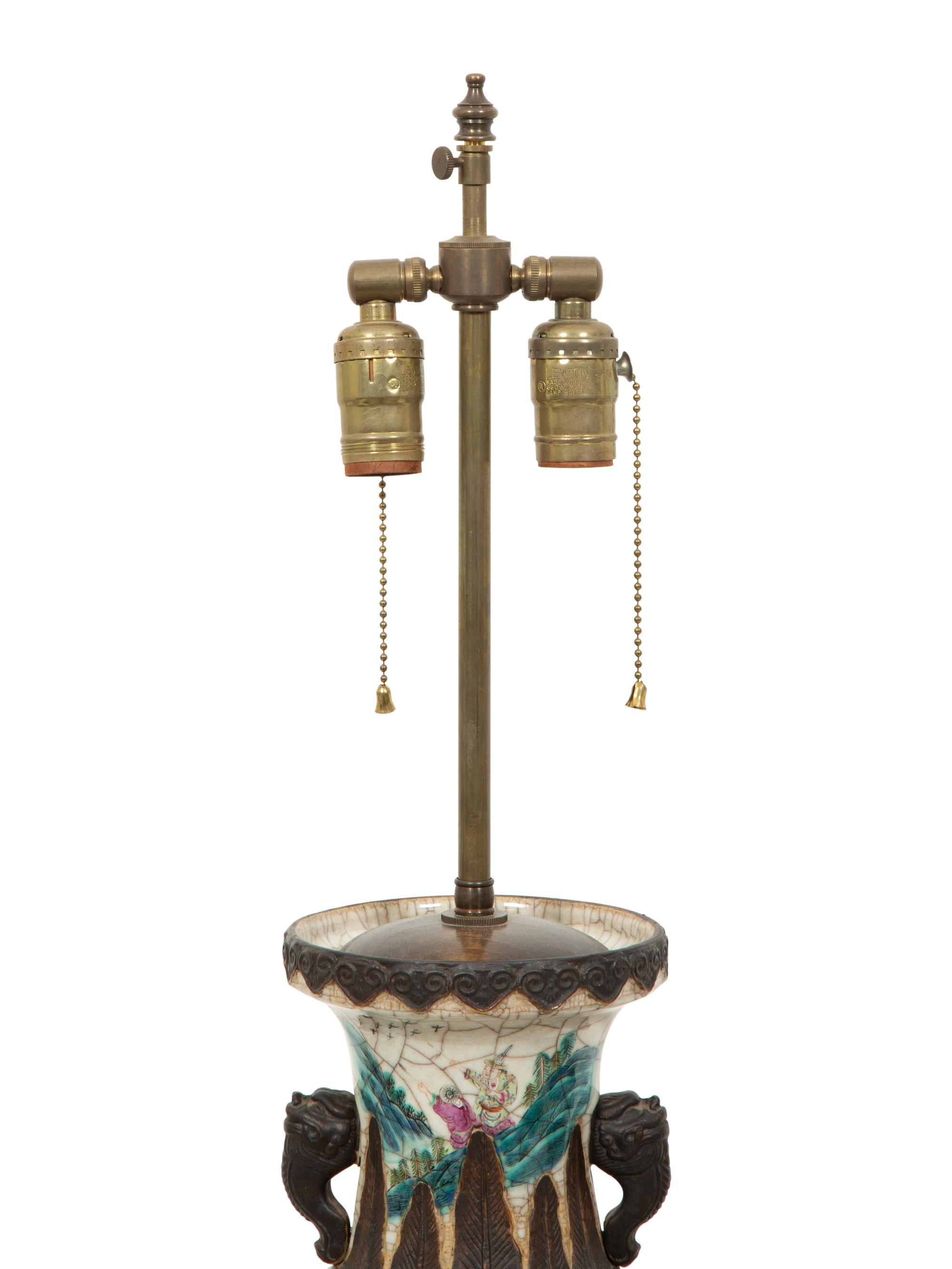 A Pair of Chinese Glazed Ceramic Vases Mounted as Lamps