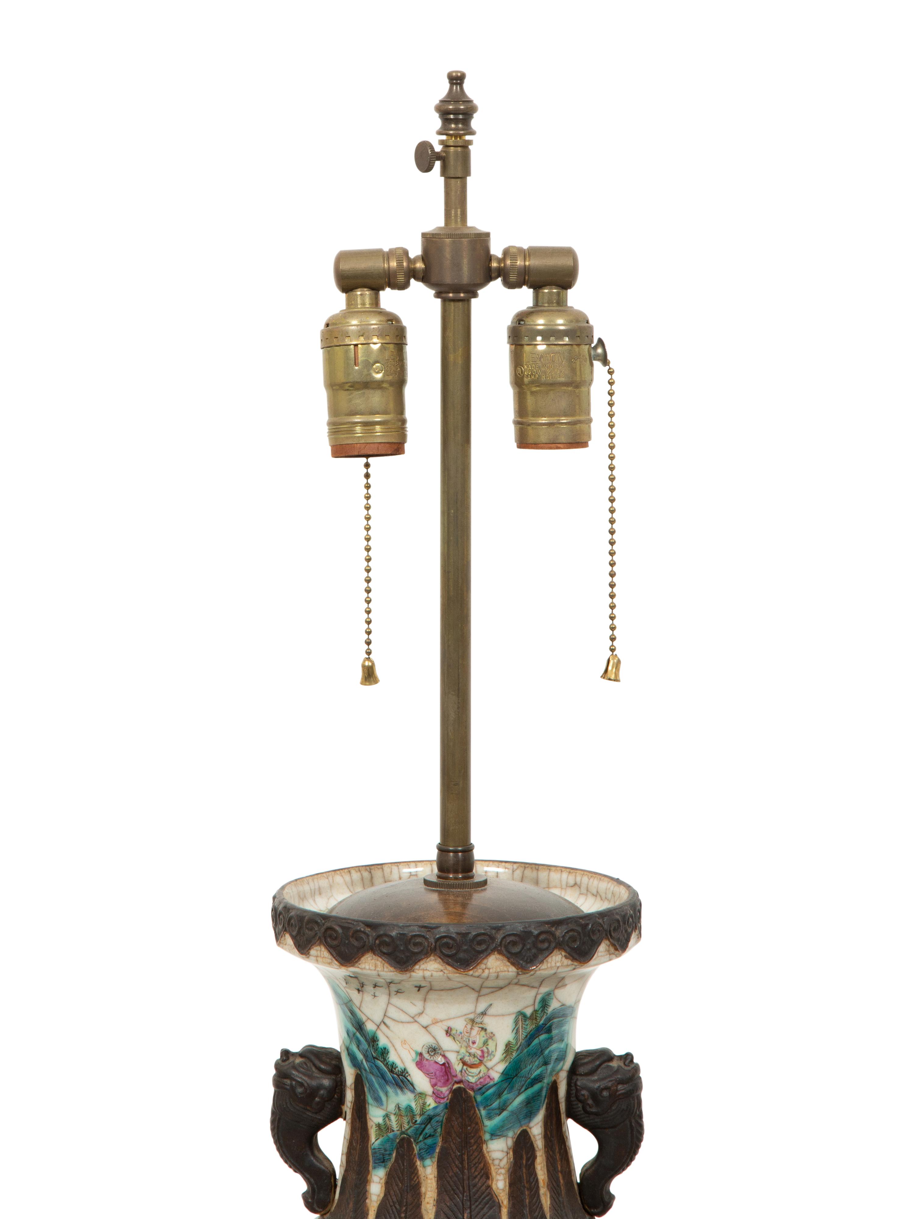 A Pair of Chinese Glazed Ceramic Vases Mounted as Lamps