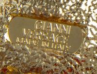 A Gianni Versace Medusa Medallion and Rhinestone Bracelet, 7.5" x 1.5".