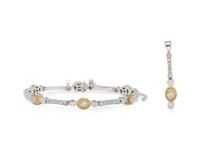 BICOLOR GOLD, DIAMOND, AND COLORED DIAMOND BRACELET AND PENDANT