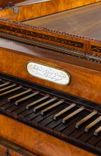 An Austrian Enamel Inset Burlwood Harpsichord