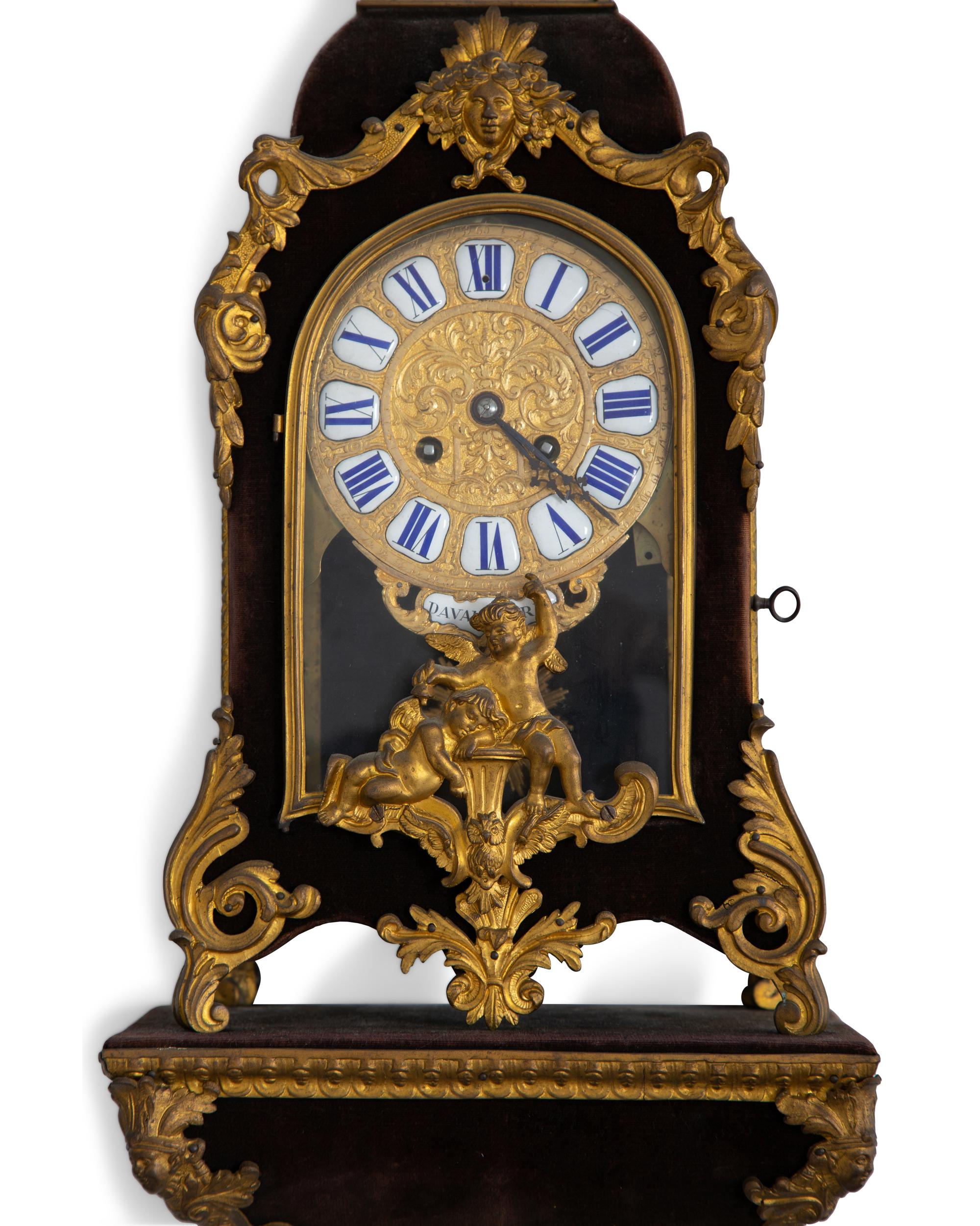 A Louis XV Style Gilt Bronze and Velvet Bracket Clock