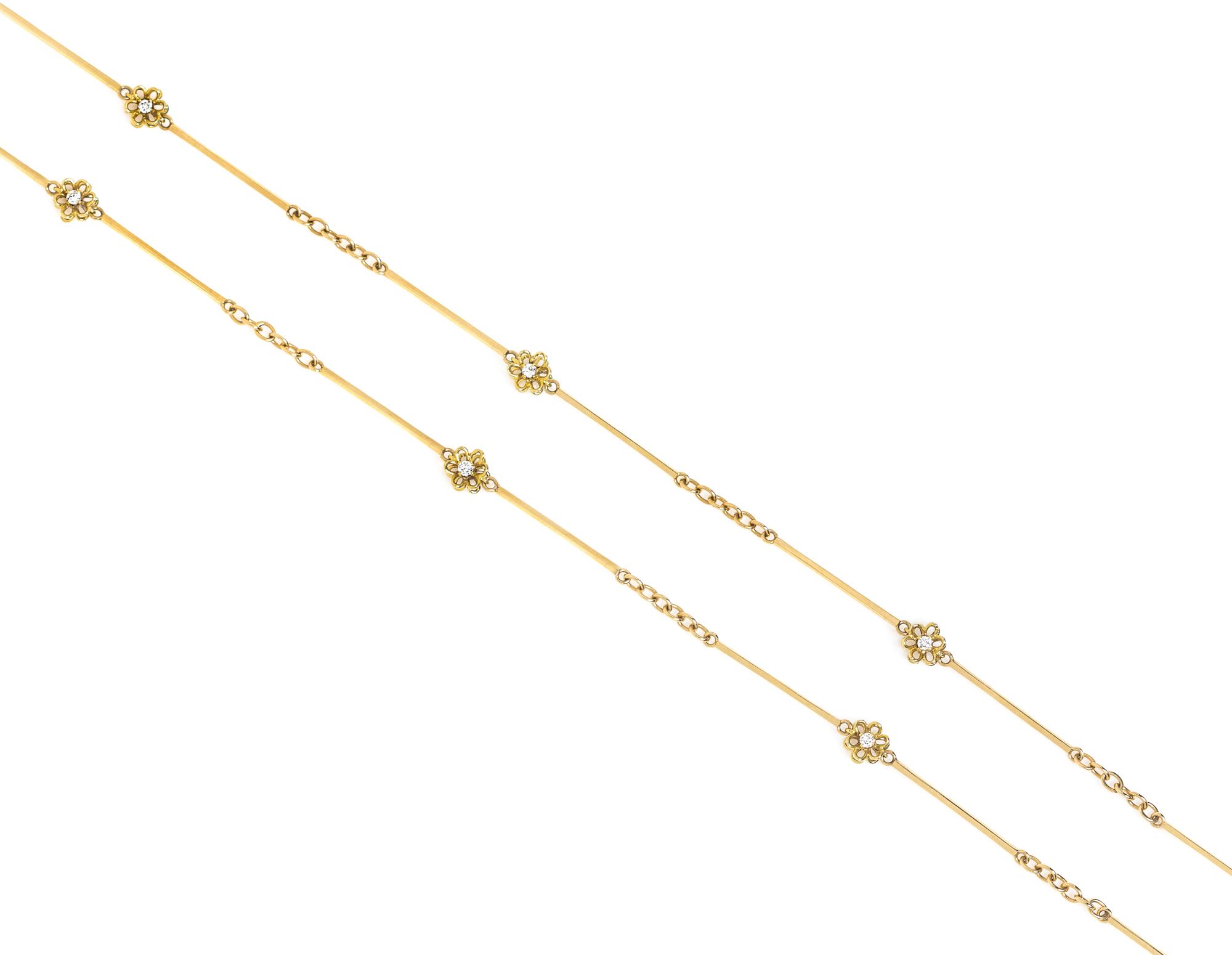 A Yellow Gold and Diamond Flower Motif Necklace, 11.80 dwts.