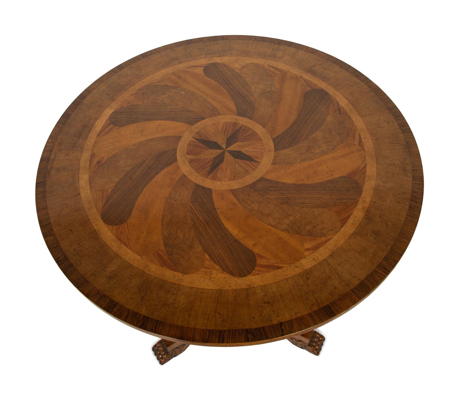 A Baker Regency Style Mahogany, Walnut and Elmwood Center Table