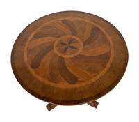 A Baker Regency Style Mahogany, Walnut and Elmwood Center Table