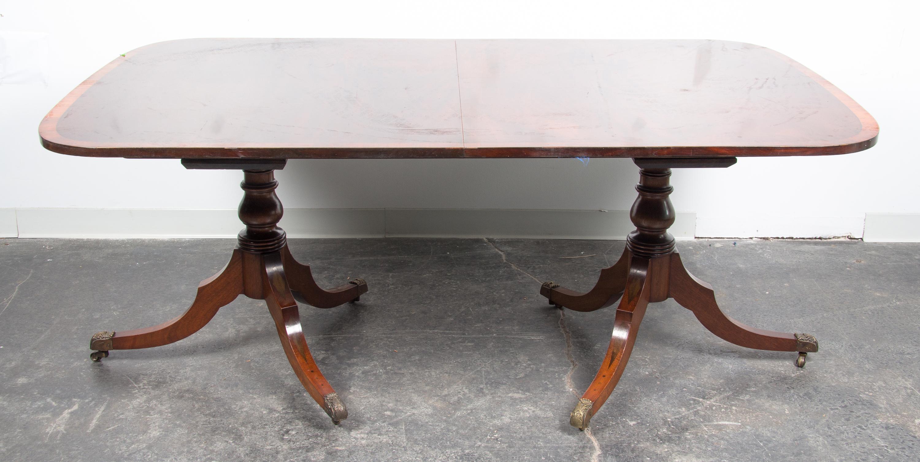 A George III Style Mahogany Dining Table Width of top 72 inches. — SECOND HALF 20TH CENTURY