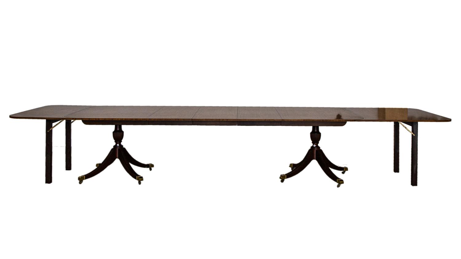 A George III Style Mahogany Double Pedestal Extension Dining Table